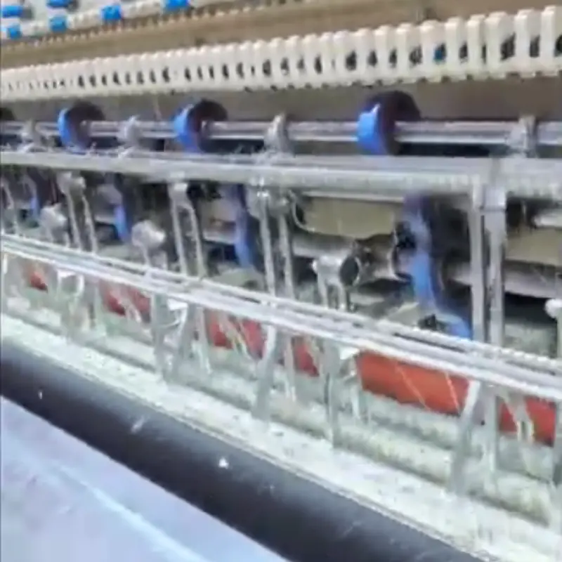 Multi-needle quilting machine in action